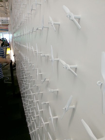 A wall decorated with little propellers, same as found on Noogler's hats given to every new Google employee - Noogler.