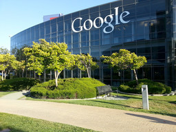 The famous Google building with a big white logo.